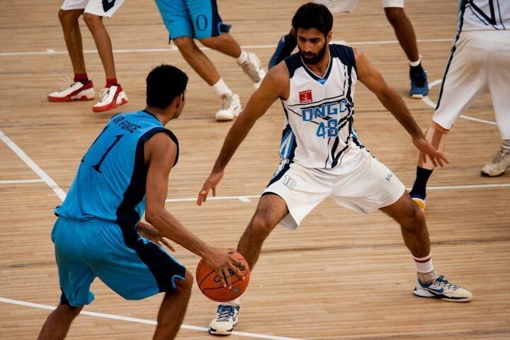 Basketball-players-reading-the-play-in-a-basketball-game Basketball-players-reading-the-play-in-a-basketball-game