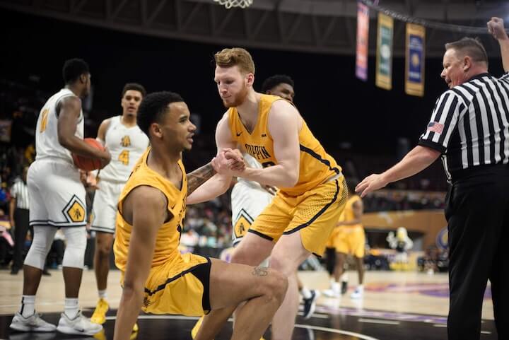 Loose Ball Foul Basketball 01 basketball-player-commits-a-loose-ball-foul-during-a-game