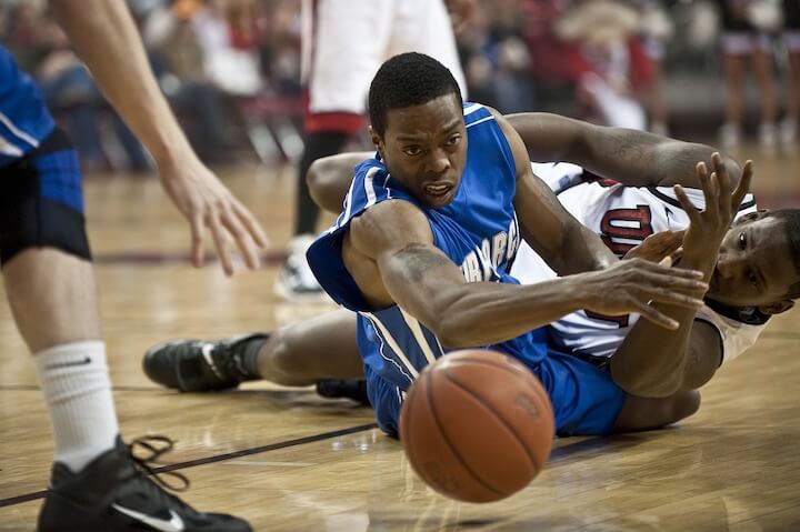 Loose Ball Foul Basketball basketball-player-dives-for-the-loose-ball