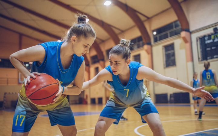 5 Second Violation in Basketball Female basketball player tries to get a 5 second violation on opponent